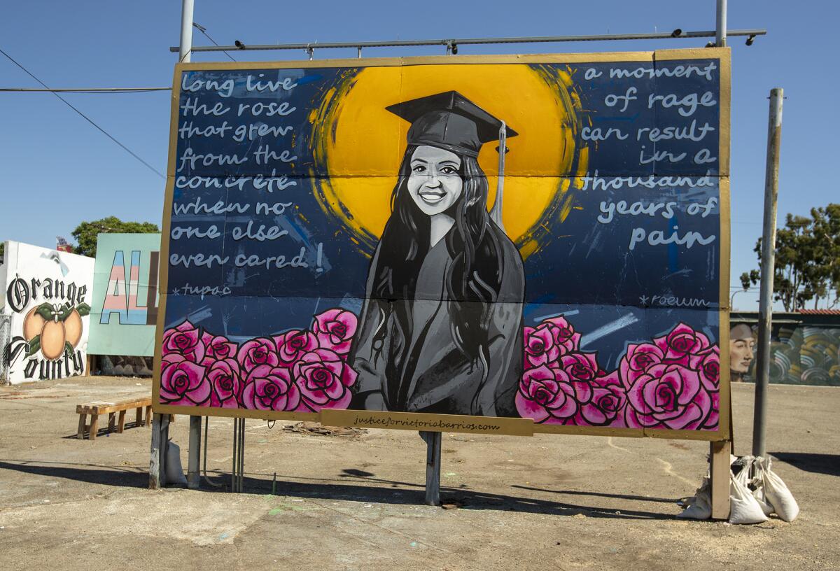 A mural of a young woman.