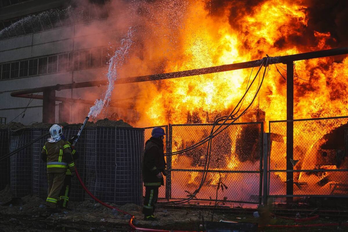 Firefighters respond after a Russian attack in Kyiv.