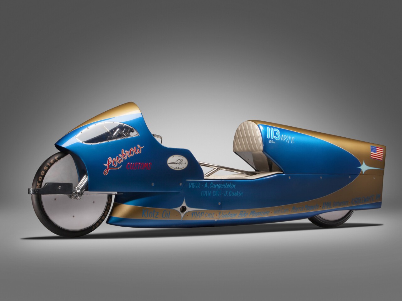 The Alp Racing Design Asymmetric Aero (2014) is part of the custom motorcycle exhibit at the Petersen Automotive Museum.