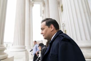 FILE - Rep. George Santos, R-N.Y., leaves the Capitol after being expelled from the House of Representatives, Dec. 1, 2023, in Washington. Santos alleged in a lawsuit in New York, Saturday, Feb. 17, 2024, that late-night host Jimmy Kimmel deceived him into making videos on the Cameo app that were used to ridicule the disgraced lawmaker on the show. (AP Photo/Stephanie Scarbrough, File)
