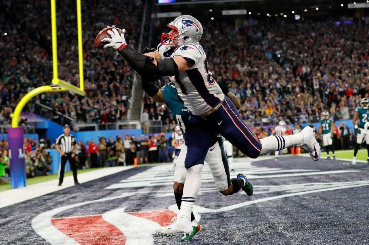 Patriots tight end Rob Gronkowski catches a 4-yard touchdown pass during the fourth quarter of Super Bowl LII.
