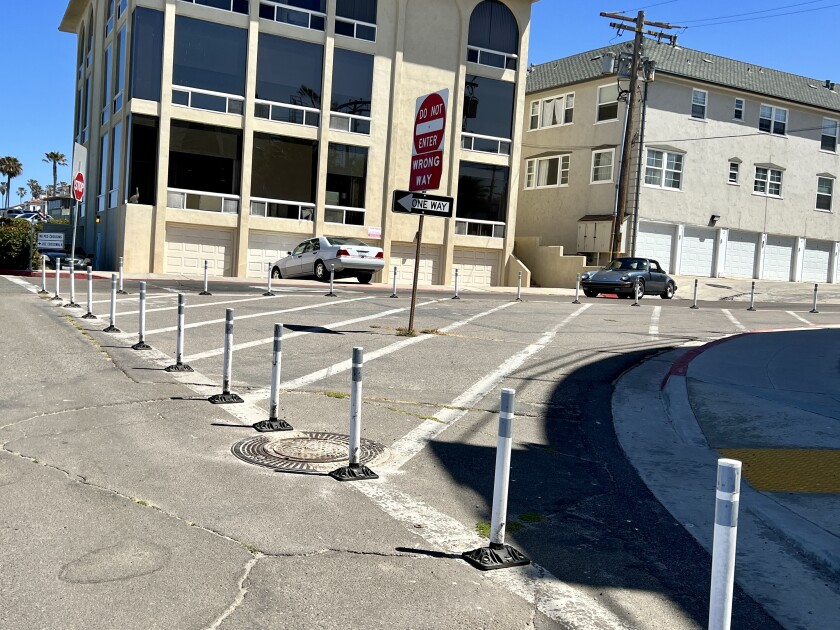 Reflective pylons like these in Windansea could go on the bend at Camino de la Costa in Lower Hermosa.