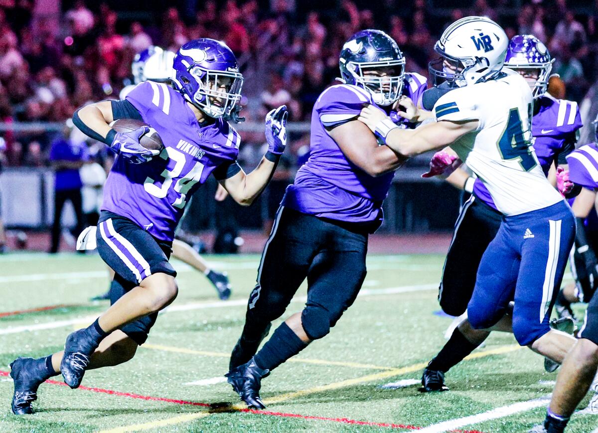 Valencia sophomore Brian Bonner carries the ball against West Ranch.