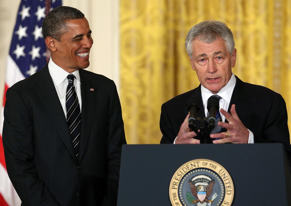 Former Sen. Chuck Hagel (R-Neb) speaks after President Obama, left, nominated him to replace Secretary of Defense Leon Panetta during an event in the East Room at the White House in Washington, D.C.