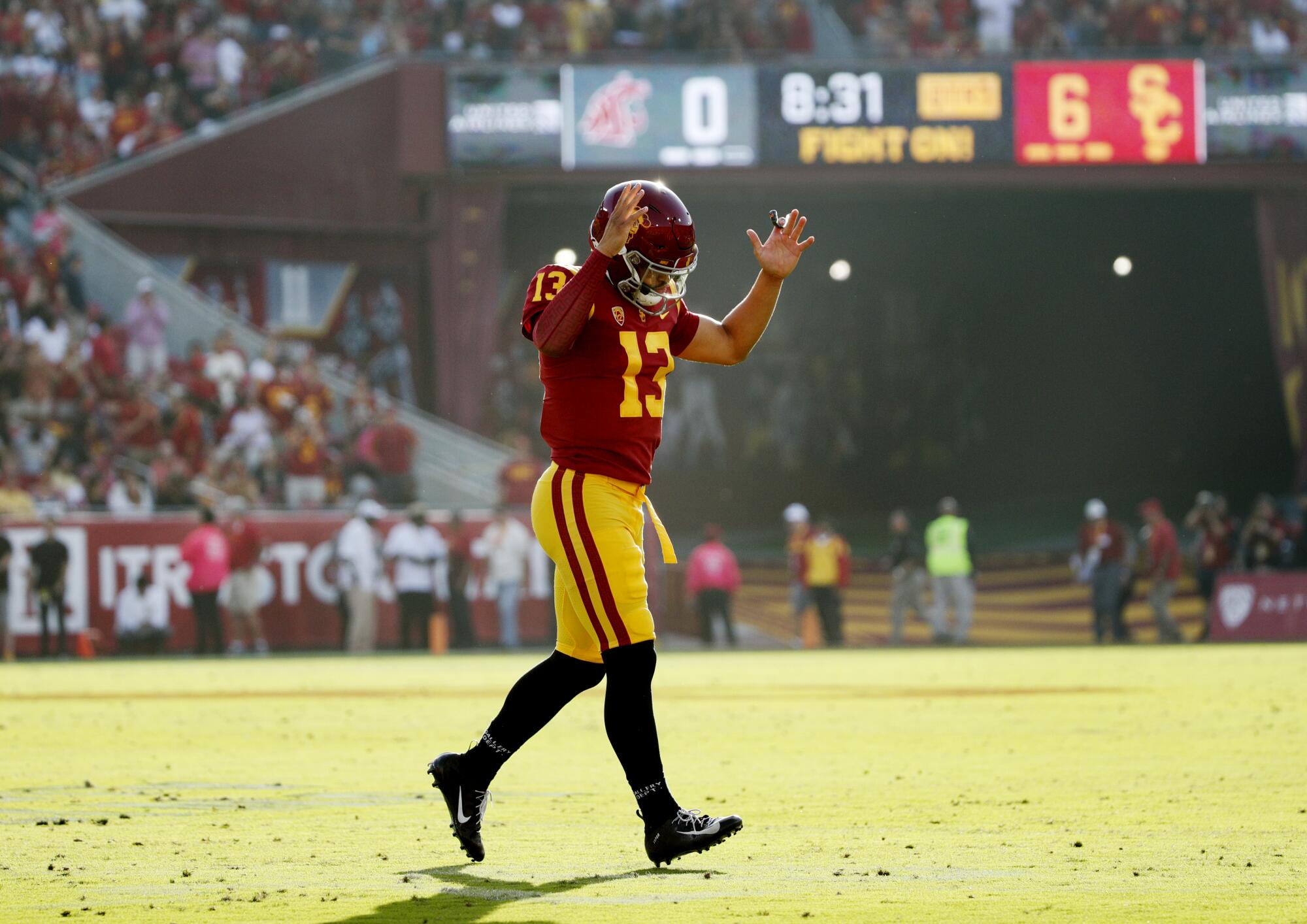 USC quarterback Caleb Williams celebrates after throwing a touchdown pass against Washington State.