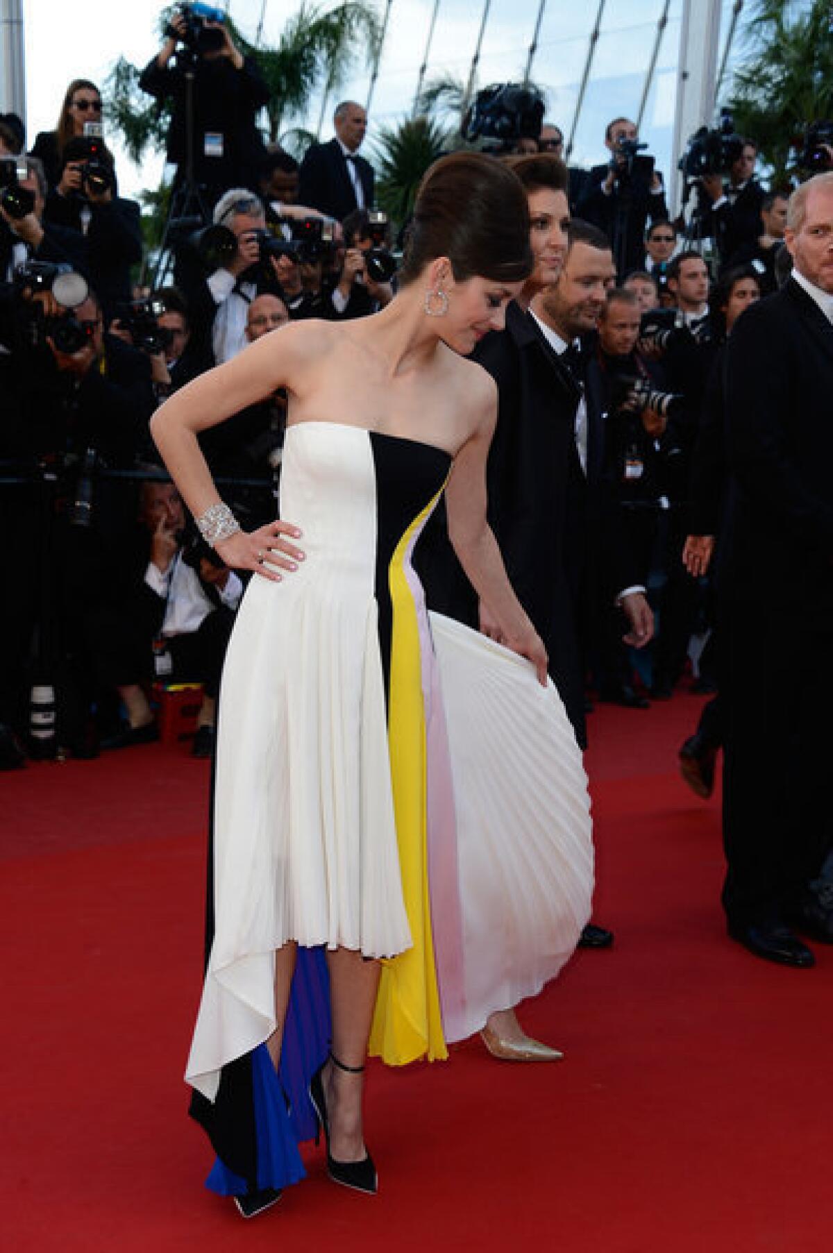 Marion Cotillard shows off her Dior gown at "Blood Ties" premiere during the 66th Annual Cannes Film Festival at the Palais des Festivals on Monday.