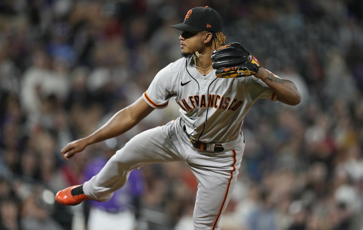 Giants reliever Camilo Doval works in the ninth inning against the Rockies on Sept. 24.