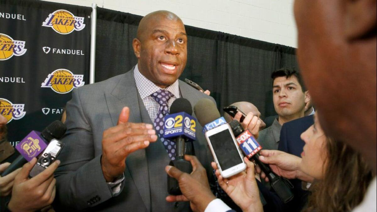 Lakers President Magic Johnson speaks at a news conference on March 10.