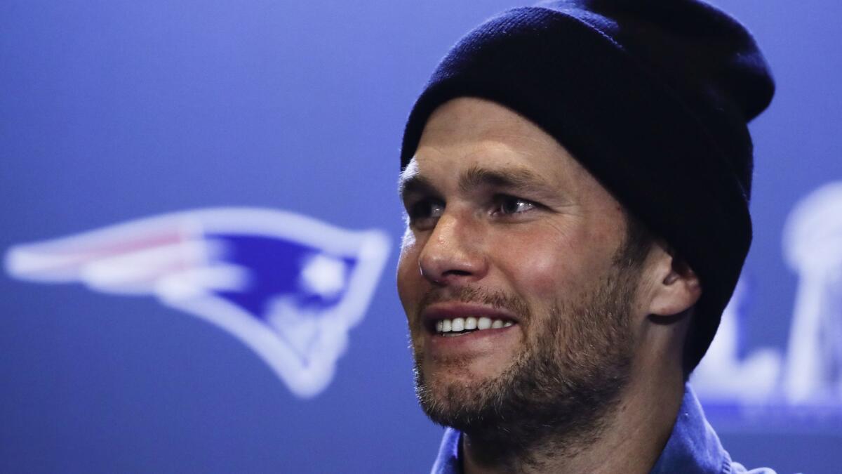New England Patriots quarterback Tom Brady speaks with members of the media during a news conference Thursday ahead of Sunday's Super Bowl matchup with the Los Angeles Rams in Atlanta.