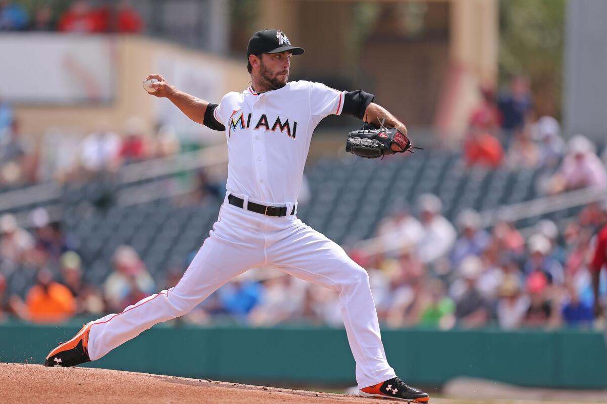 Miami's Jarred Cosart pitches against the Minnesota Twins at Roger Dean Stadium in Jupiter, Fla., on March 22.