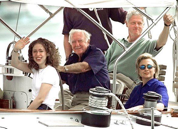Cronkite skippers a sailboat during a trip with then-President Clinton and his family off Martha's Vineyard in 1998.