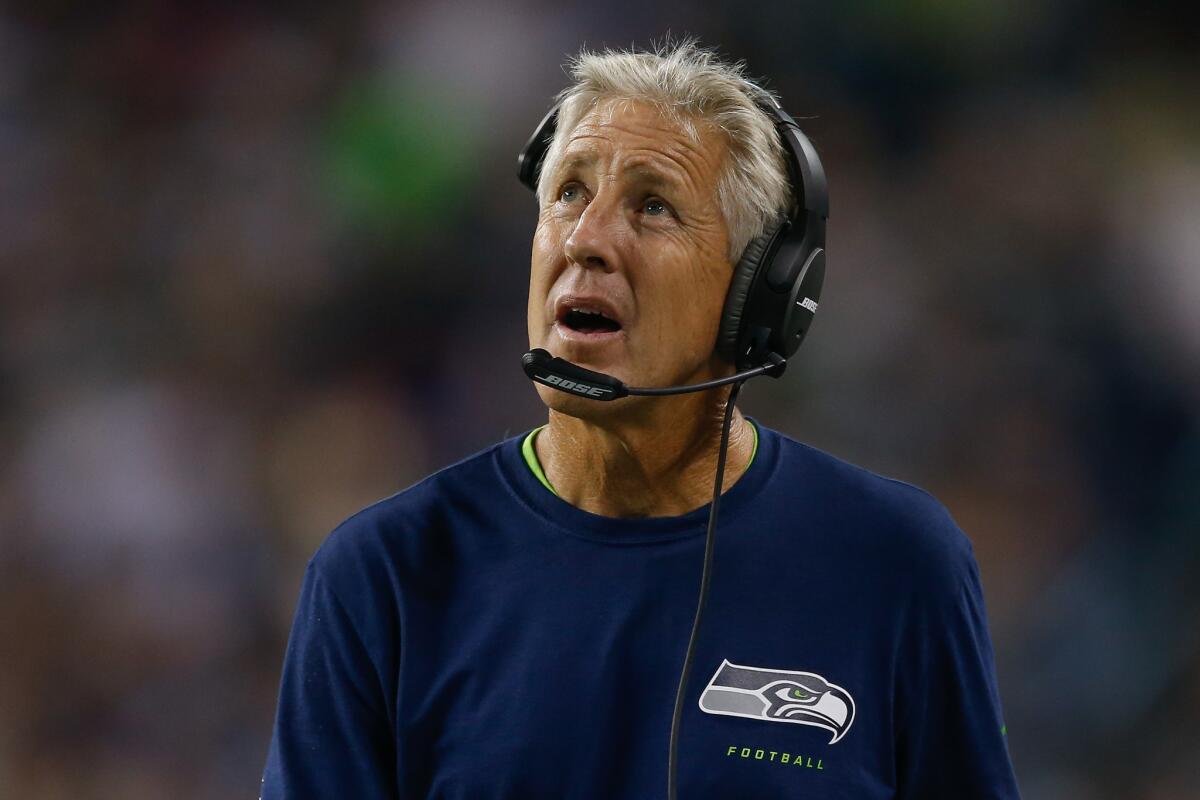 Seattle Coach Pete Carroll looks on during a preseason game against the San Diego Chargers at CenturyLink Field on Aug. 15