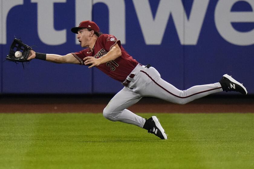 Arizona Diamondbacks center fielder Jake McCarthy catches a ball hit by New York Mets' Jeff McNeil for the out during the first inning of a baseball game Wednesday, Sept. 13, 2023, in New York. (AP Photo/Frank Franklin II)