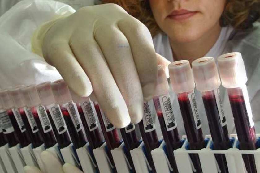 Scientists believe red blood cells' flexibility contributes to their ability to circulate for an average of 120 days. Above, viles of blood are prepared to be screened at the American Red Cross National Testing Laboratory in San Diego.