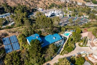 The scenic spot overlooks the Hollywood Bowl from a swimming pool, observation deck and three different viewing decks.