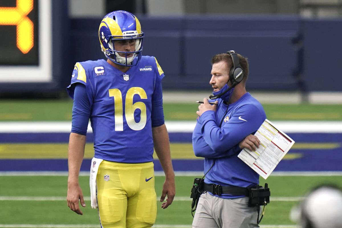 Rams coach Sean McVay talks to quarterback Jared Goff during a game against the New York Giants.