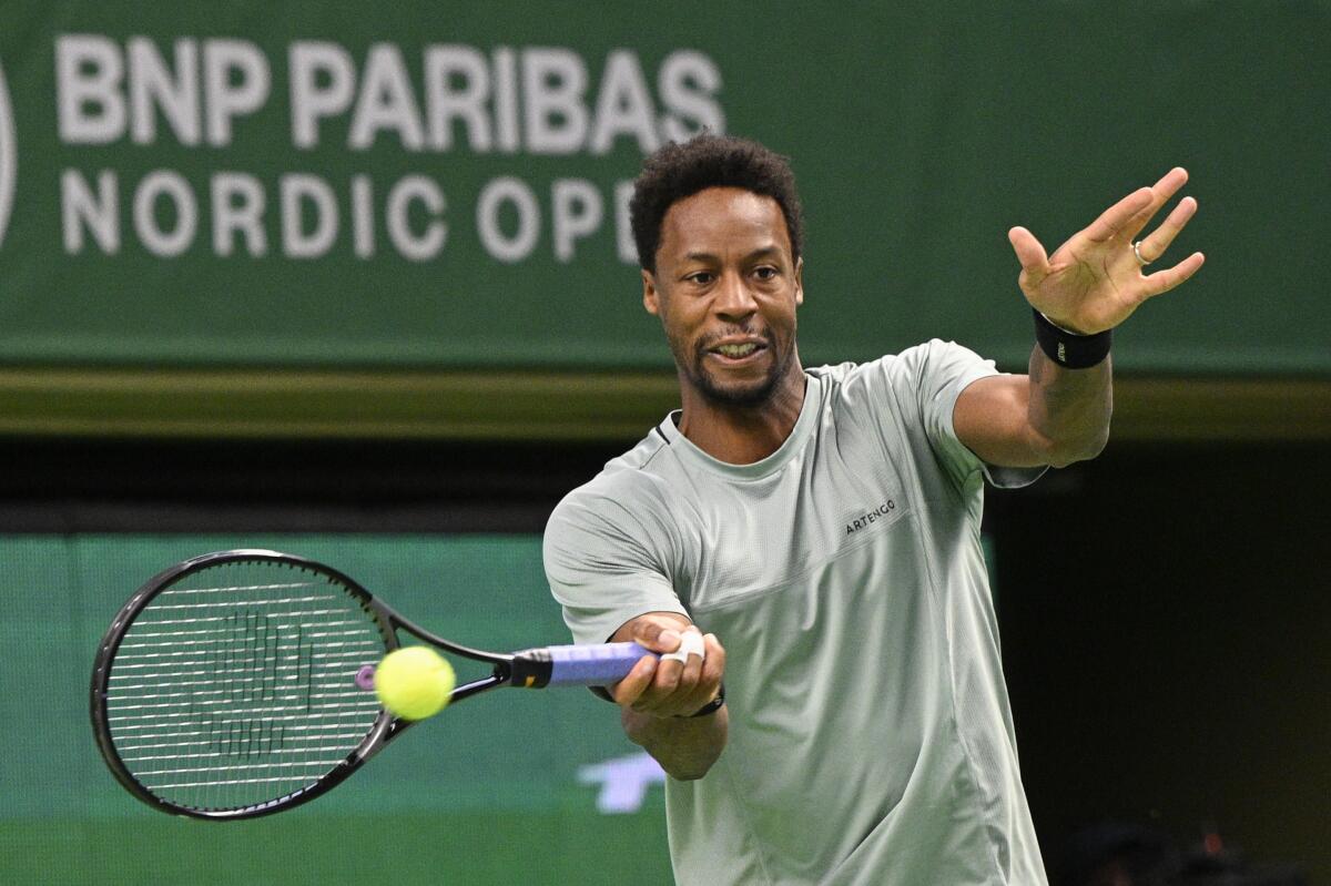 France's Gael Monfils in action against Russia's Pavel Kotov during the men's singles final at the ATP Nordic Open tennis tournament in the Royal Tennis Hall, in Stockholm, Sunday, Oct. 22, 2023. (Anders Wiklund/TT News Agency via AP)