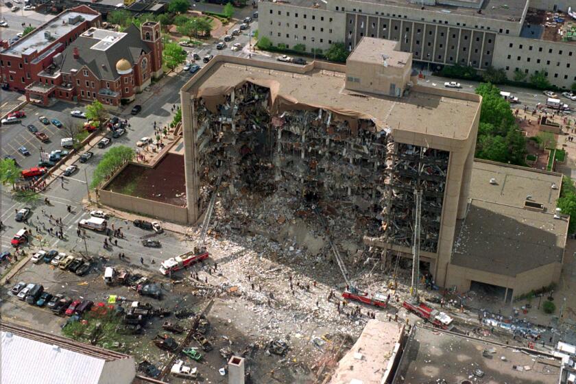 FILE - This April 19, 1995 file photo shows the north side of the Alfred Murrah Federal Building in Oklahoma City, after it was destroyed by a domestic terrorist's bomb killing 168 people. (AP Photo/File)