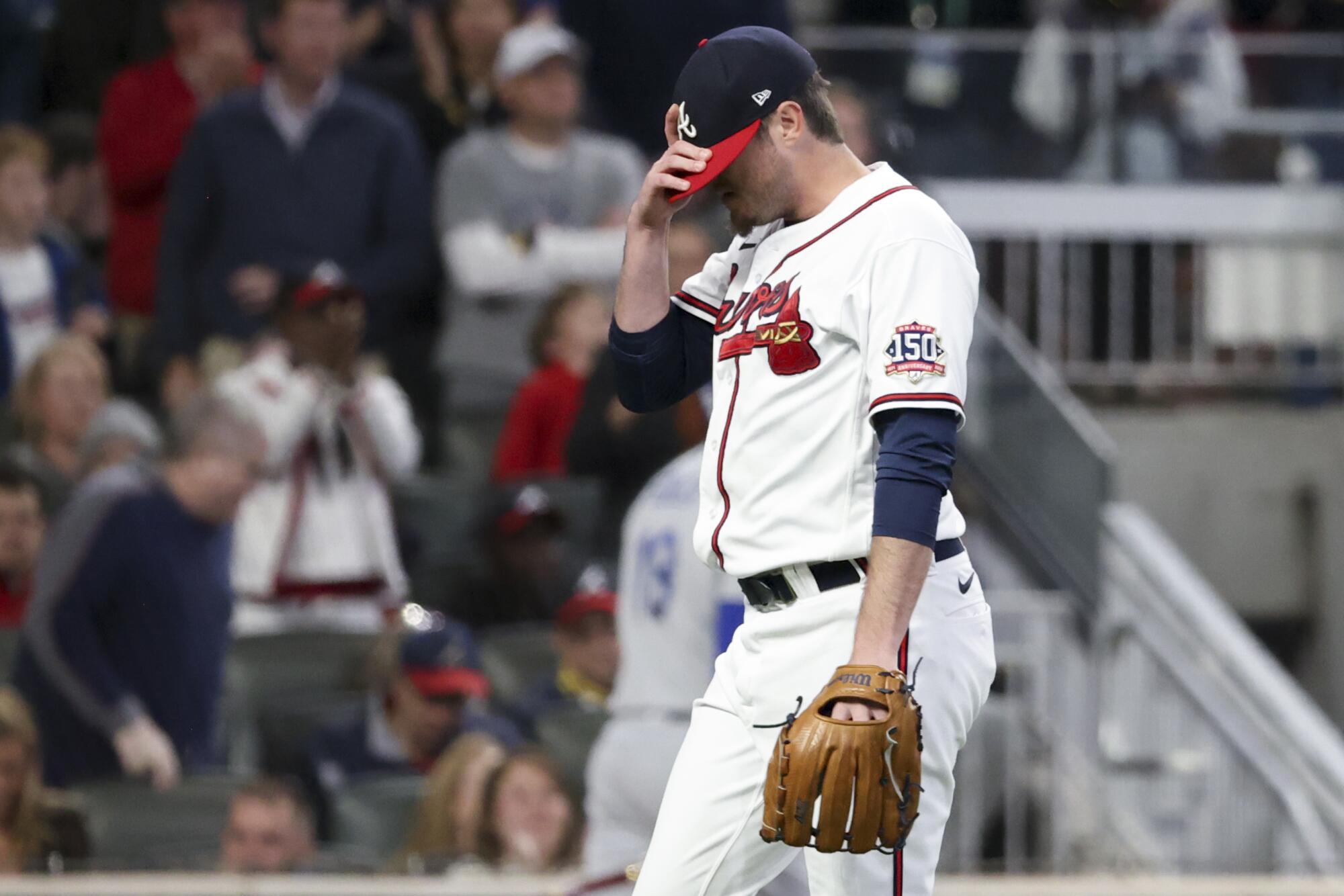 Atlanta Braves relief pitcher Luke Jackson reacts after retiring the side