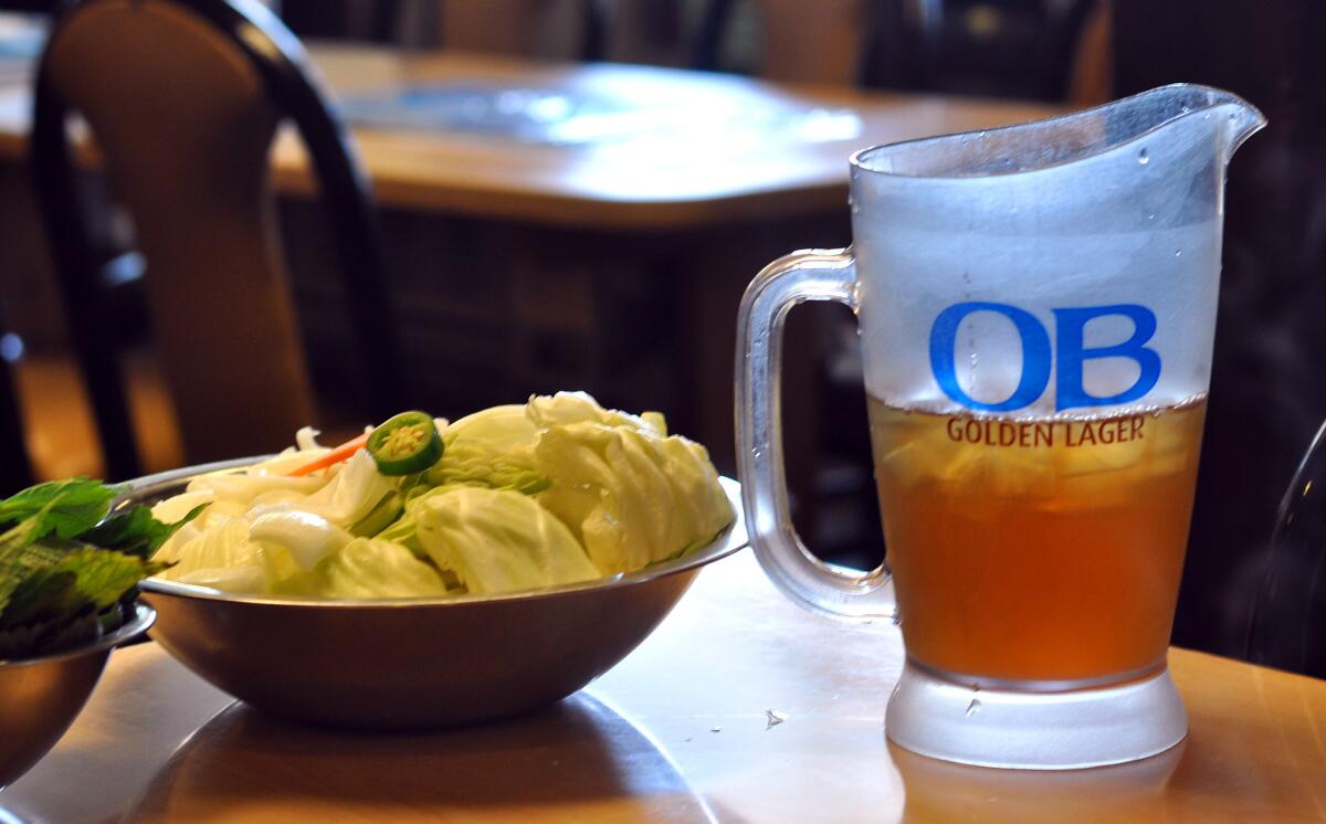 Vegetables that will go into the grilling pan along side some cold Barley Tea at Mapo Galbi.