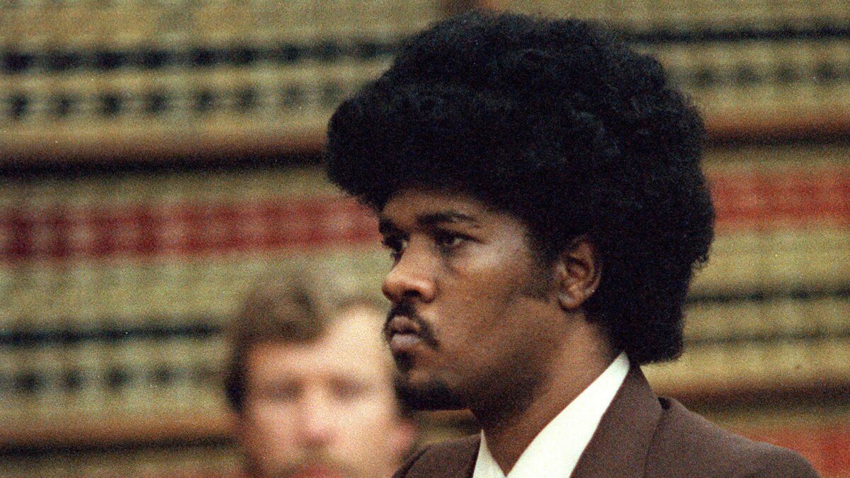 May 15, 1985 file photo of convicted murder, Kevin Cooper, as he stands before the judge while being sentenced to death for the slayings of family from Chino.