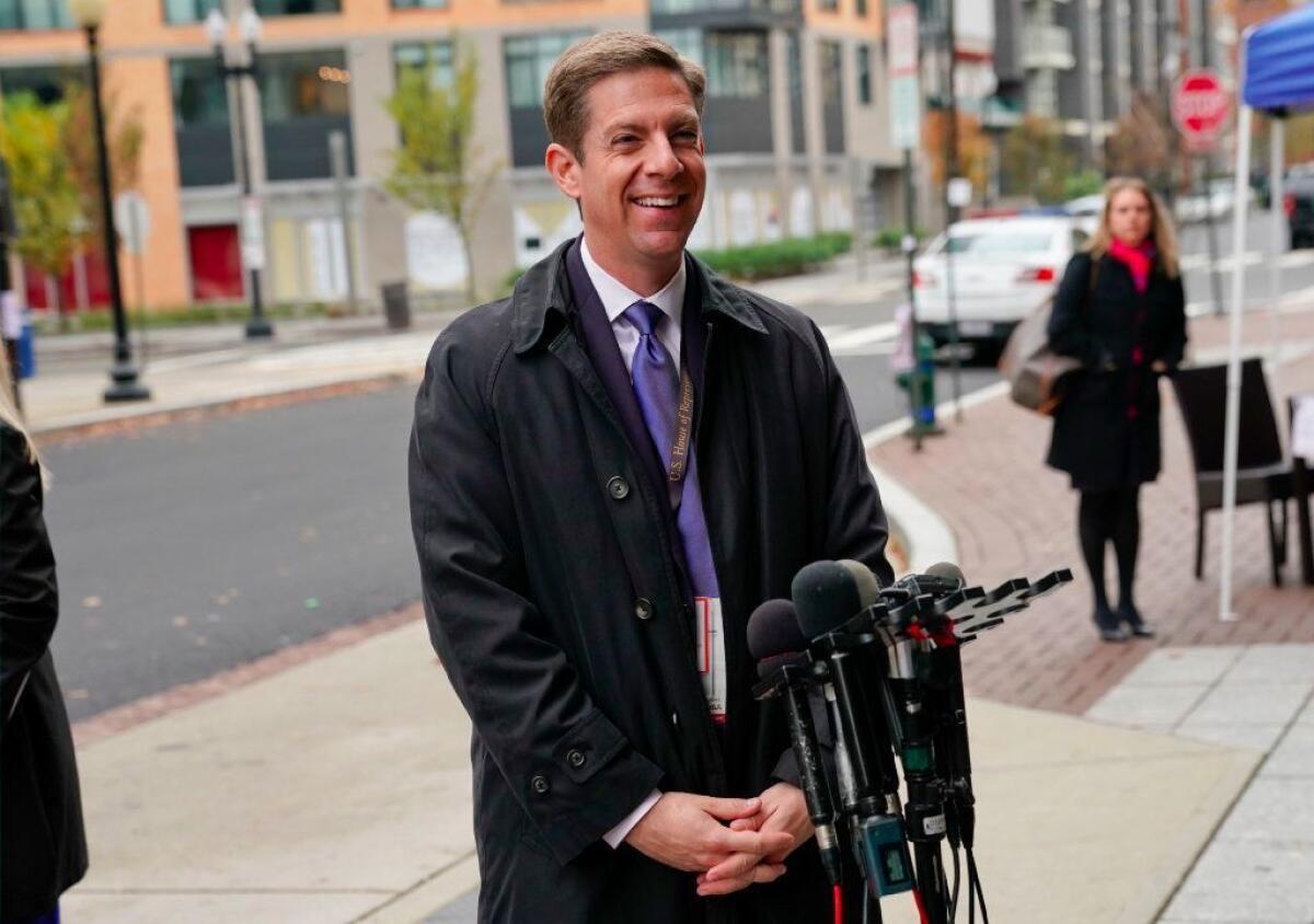 Rep.-elect Mike Levin (D-Calif.) addresses reporters after arriving for orientation for new members of Congress.