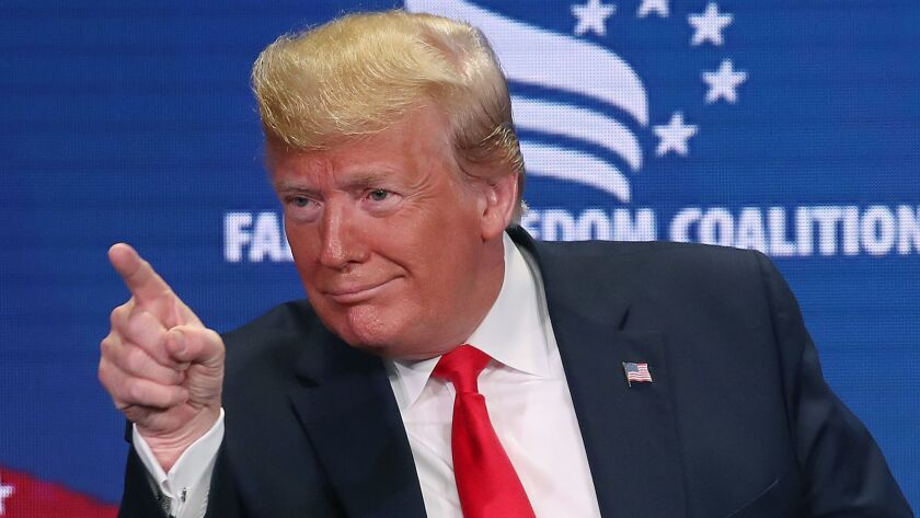President Trump gestures to the audience after speaking June 26 at the Marriott Wardman Park in Washington, DC.
