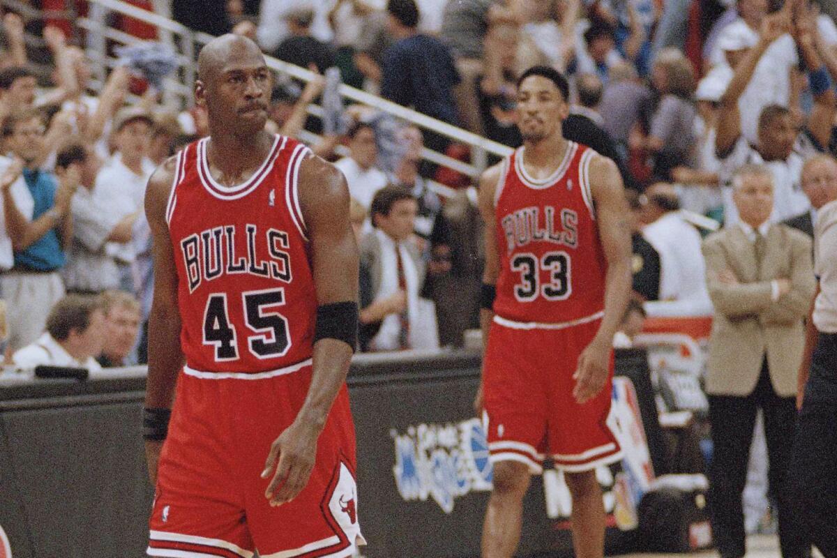 Chicago Bulls' Michael Jordan of the East drives against San
