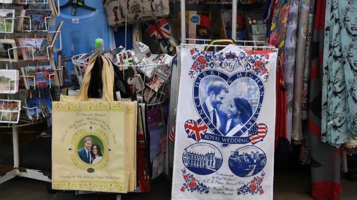 Royal wedding souvenirs are seen in a gift shop in Windsor on Friday, the day before the royal wedding of Britain's Prince Harry and American actress Meghan Markle at St George's Chapel in Windsor Castle.