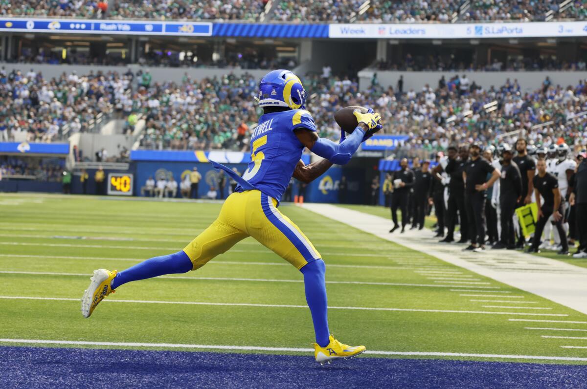The Rams' Tutu Atwell catches a pass  from Mathew Stafford for a touchdown against the Philadelphia Eagles.