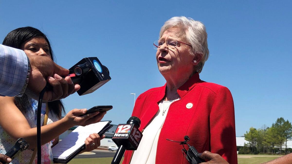 Alabama Gov. Kay Ivey told reporters Wednesday that she hadn't yet decided whether to sign a bill that would impose the most restrictive abortion limitations in the nation. She signed it later in the day.