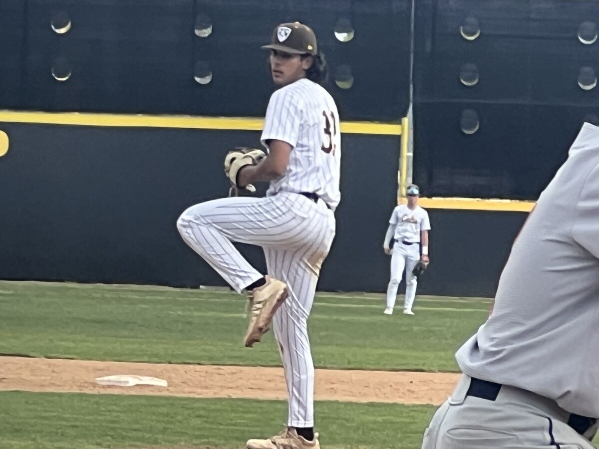 Diego Velazquez of Crespi prepares to deliver a pitch.