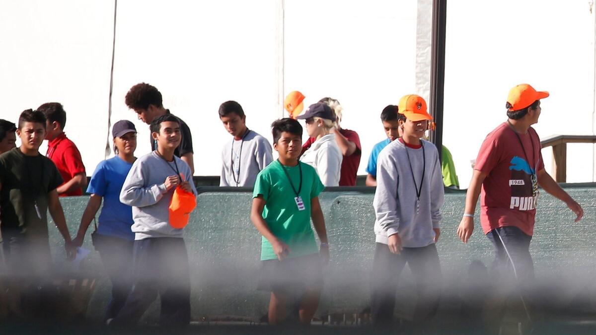 Migrant children separated from their parents at a detention center in Homestead, Fla.