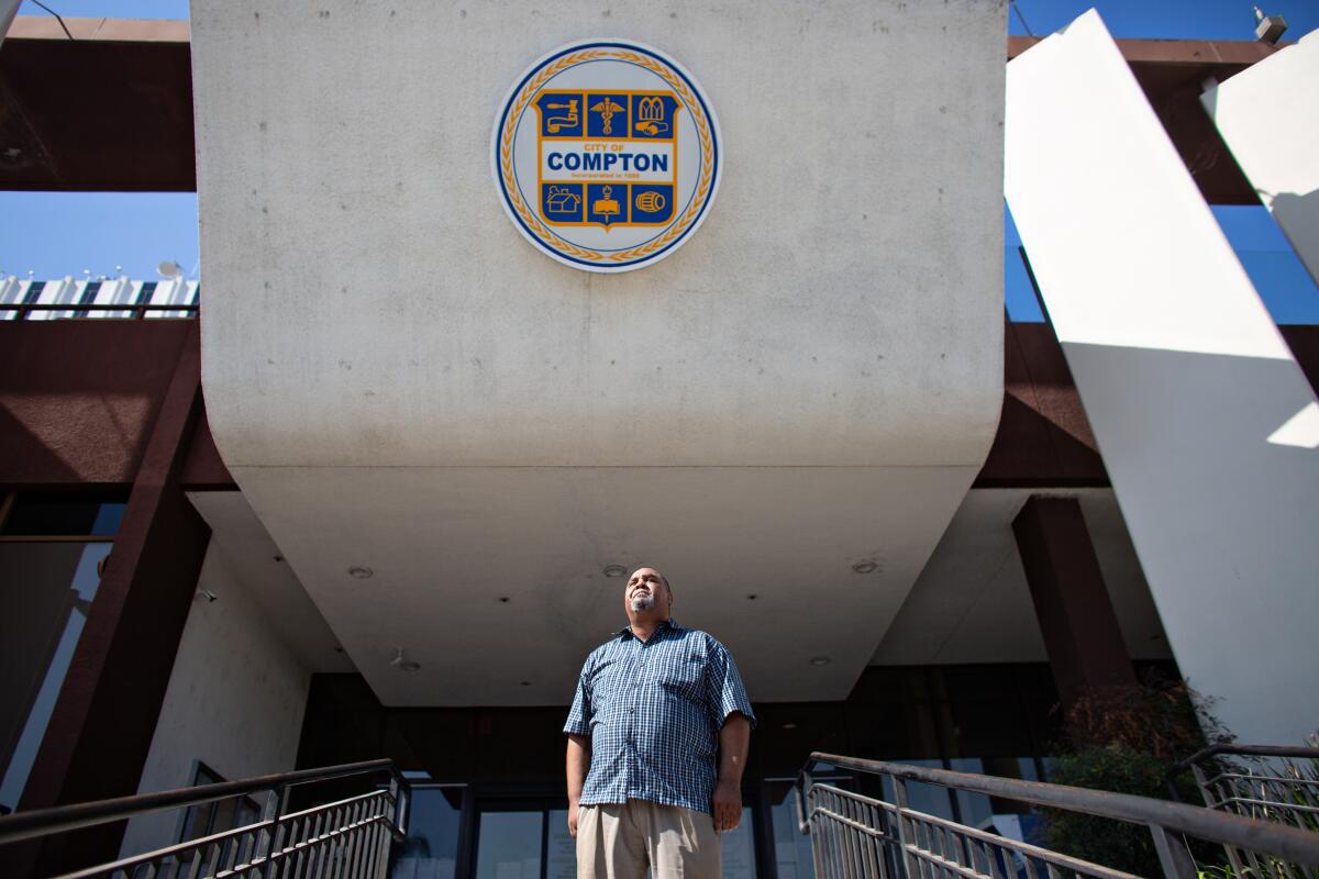William Kemp stands on the steps of Compton City Hall.