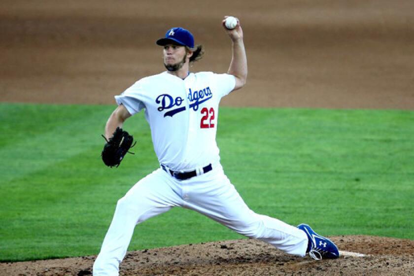 Dodgers left-hander Clayton Kershaw throws a pitch against the Giants on Oct. 3, 2012.