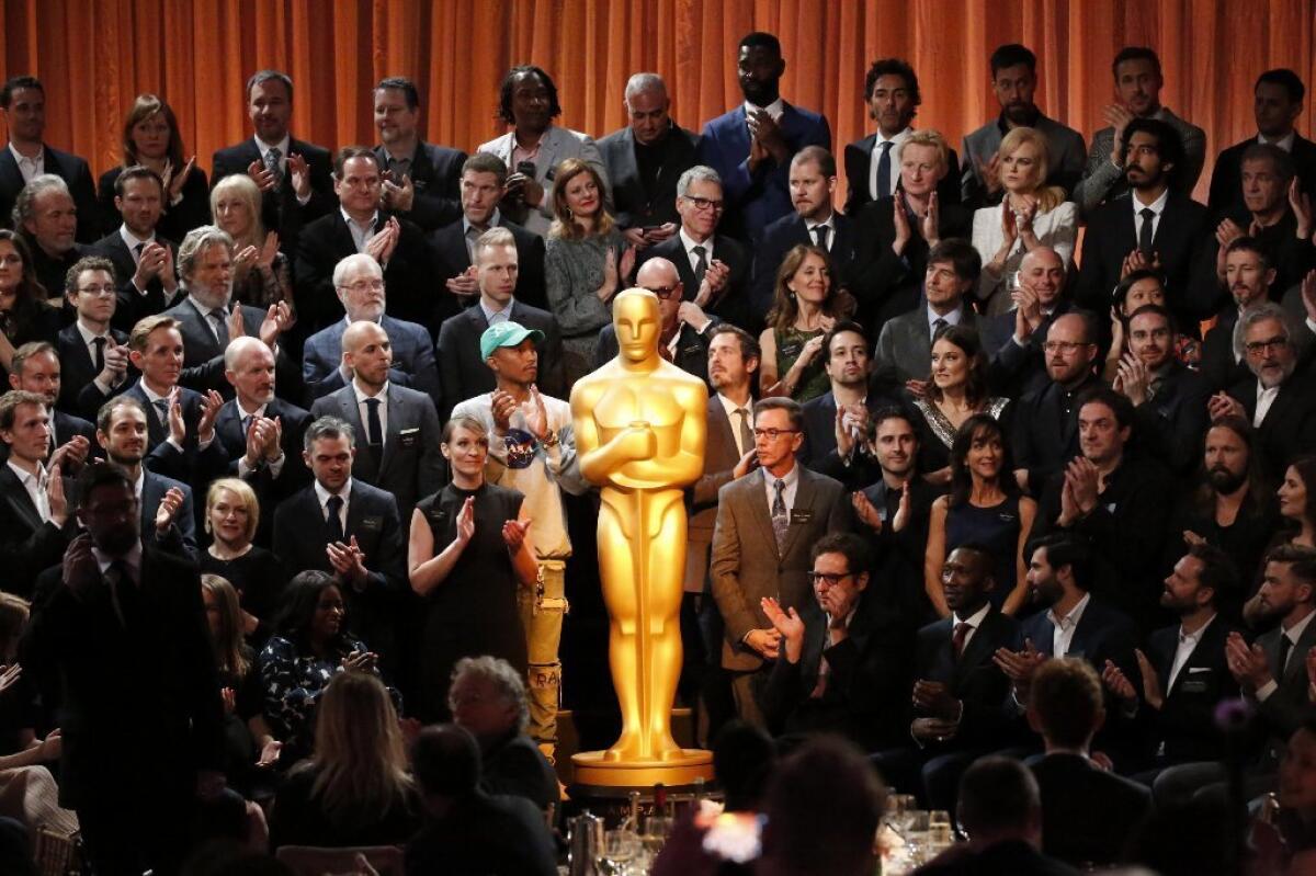 Attendees on Monday prepare for the class picture of all the nominees during the Academy Awards annual nominees luncheon for the 89th Oscars at the Beverly Hilton Hotel in Beverly Hills.