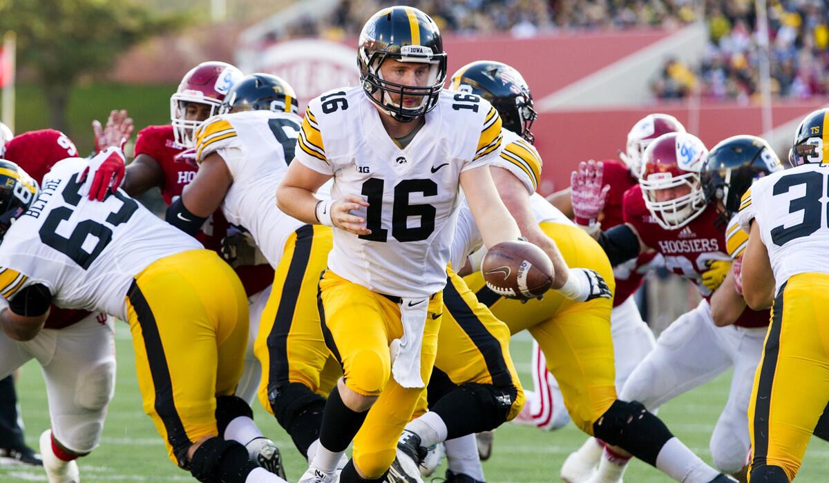 Iowa quarterback C.J. Beathard (16) drops back to hand off the ball during the first half against Indiana last Saturday.