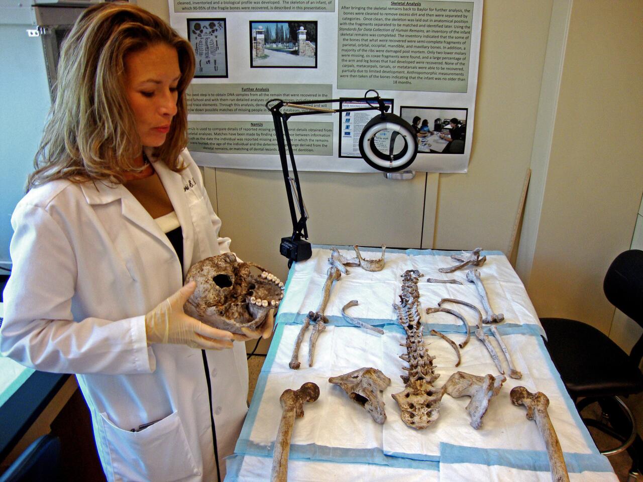 Lori Baker, an associate professor of forensic anthropology at Baylor University in Waco, Texas, inventories human remains recovered on a South Texas ranch. Baker has spent the past decade at the building databases and working with Mexican and U.S. authorities to identify the remains of illegal immigrants. There has been a recent increase in such deaths in Texas. deaths.
