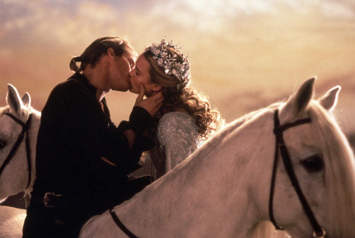 Cary Elwes and Robin Wright  kiss in “The Princess Bride”