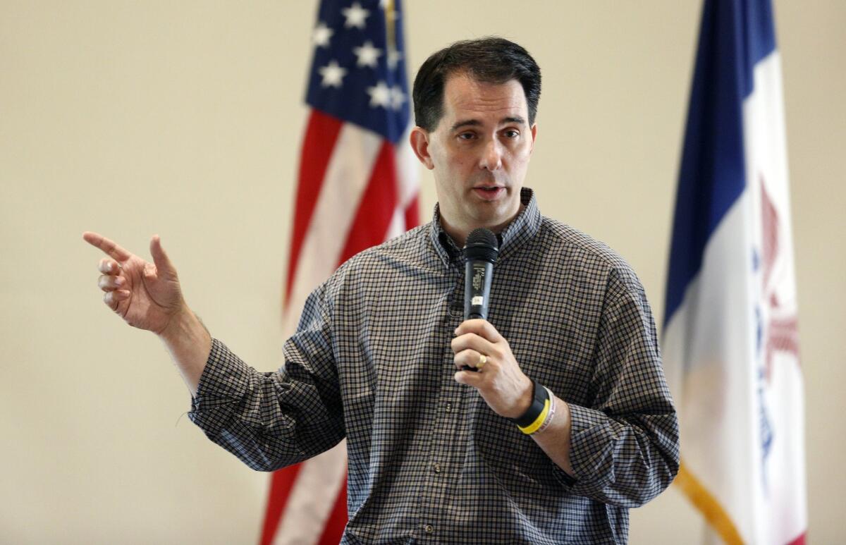 Republican presidential candidate, Wisconsin Gov. Scott Walker speaks at a fundraising event for Rep. Pat Grassley at the PIPAC Centre on the Lake Sunday, July 19, 2015, in Cedar Falls, Iowa. (Matthew Putney/The Courier via AP) MANDATORY CREDIT