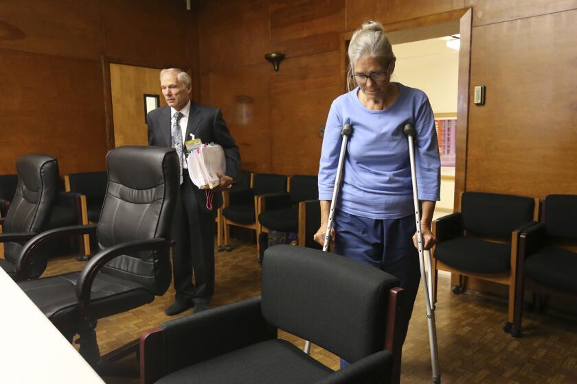 File - In this Sept. 6, 2017, file photo, Leslie Van Houten enters with her attorney Rich Pfeiffer before her parole board hearing at the California Institution for Women in Corona, Calif. California Gov. Gavin Newsom overruled a parole board's decision to free Charles Manson follower Leslie Van Houten on Monday, June 3, 2019, marking the third time a governor has stopped the release of the youngest member of Manson's murderous cult. Van Houten, 69, is still a threat, Newsom said, though she has spent nearly half a century behind bars and received reports of good behavior and testimonials about her rehabilitation. (Stan Lim/Los Angeles Daily News via AP, Pool, File)