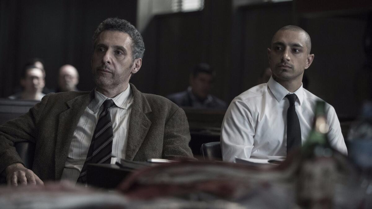 This image released by HBO shows John Turturro, left, and Riz Ahmed in "The Night Of." The program was nominated for an Emmy Award for outstanding limited series.