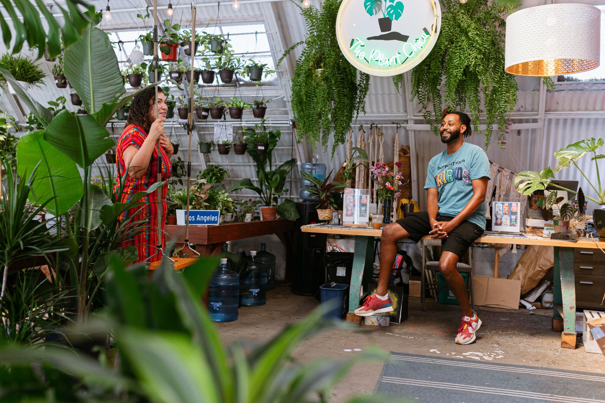 A woman and a man inside Plant Chica.