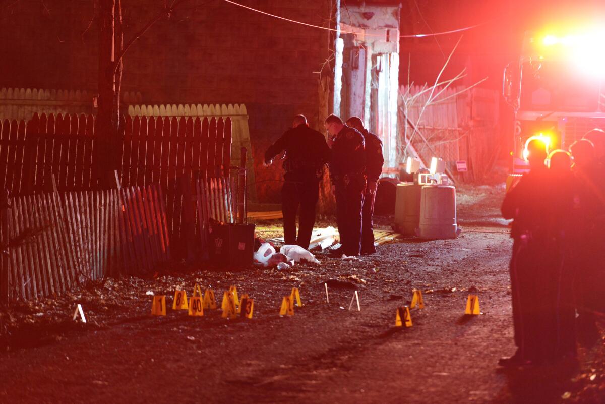 Police investigate after a deadly shooting in Wilkinsburg, Pa., on March 9