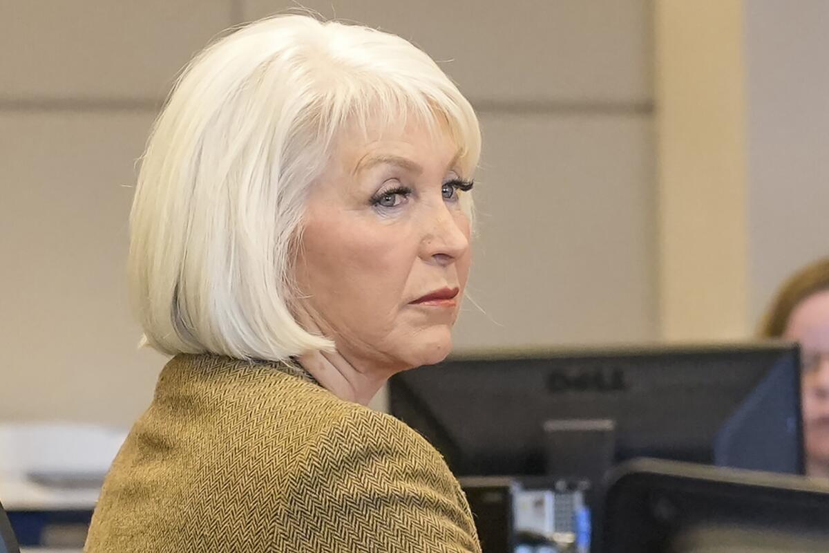 Tina Peters  listens during her trial 