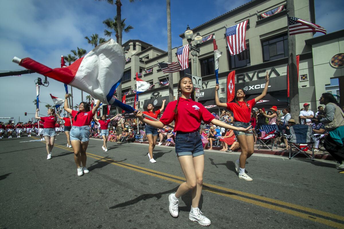 The Huntington Beach Fourth of July Host Band marches up Main Street during this year's Fourth of July parade.