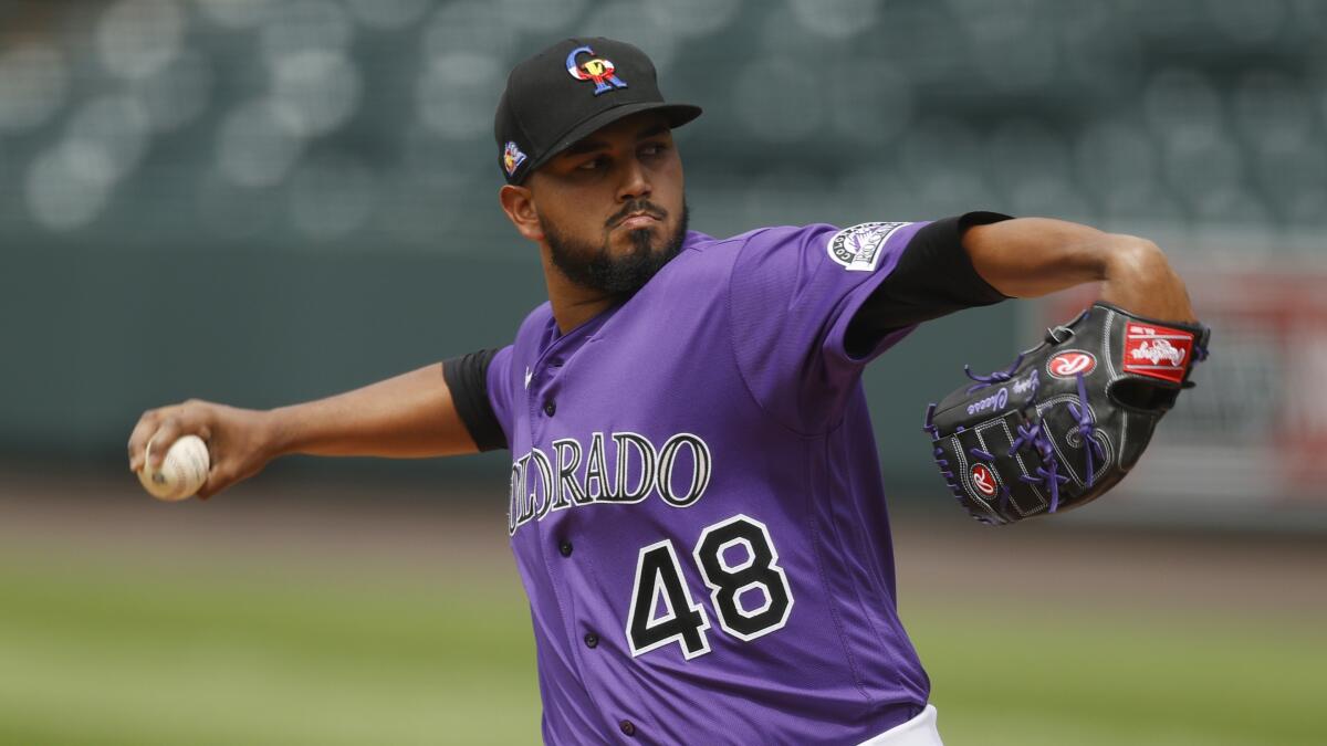 Rockies pitcher German Marquez practices with the team July 5 at Coors Field in Denver.