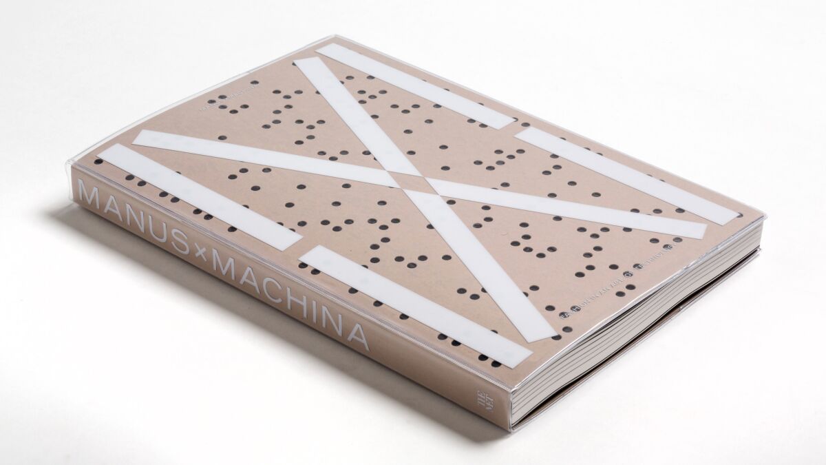 "Manus X Machina," published by the Metropolitan Museum of Art and distributed by Yale University Press, features a cover inspired by computer technology.