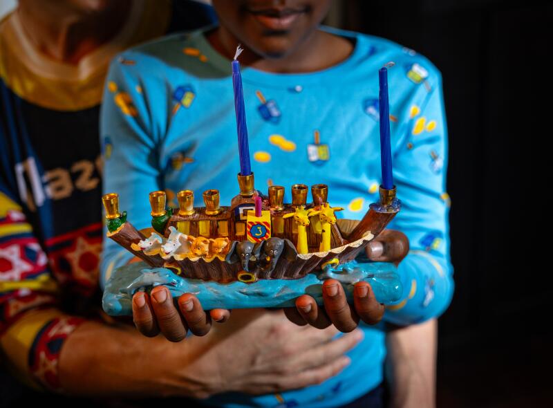 Jack Kulbersh holds his favorite Menorah.