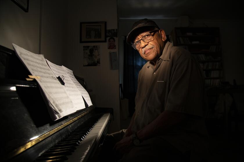 LOS ANGELES, CA - SEPTEMBER 9, 2019: Legendary LA based jazz composer/musician Bobby Bradford rehearses his original composition dedicated to baseball Hall of Famer Jackie Robinson in his home studio on September 9, 2019 in Los Angeles, California. Bradford will be debuting his work on September 29 at the Westerbeck Recital Hall at Pasadena City College. ***ATTENTION PREPRESS: PLEASE KEEP DARK SHADOWS***(Gina Ferazzi/Los AngelesTimes)